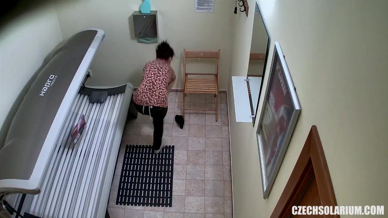 Shaved and Tight Pussy Caught in Solarium